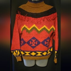 Beautiful vintage sweater featuring bold Southwestern / geometric Pattern